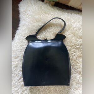 Vtg 1960s Rosenfeld leather handbag gold structural piece black leather vintage